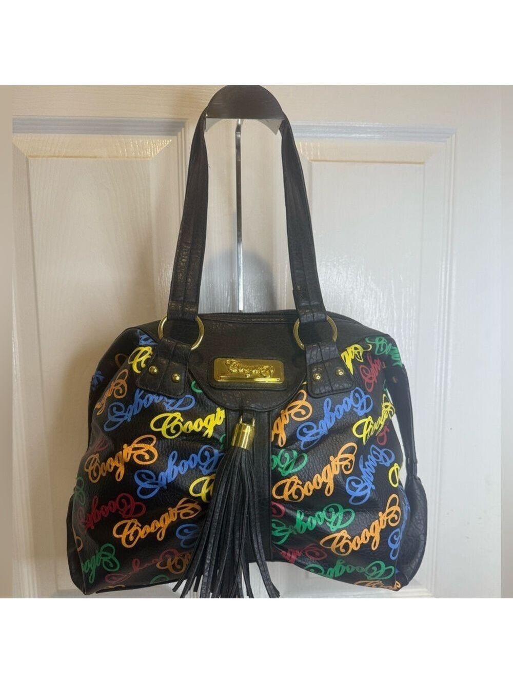 COOGI VINTAGE AUSTRALIAN MONOGRAM BLACK BAG WITH TASSLE